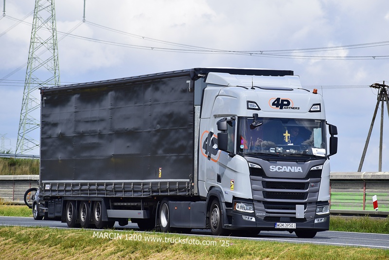 4 PARTNERS-crop-SCANIA R NG.JPG